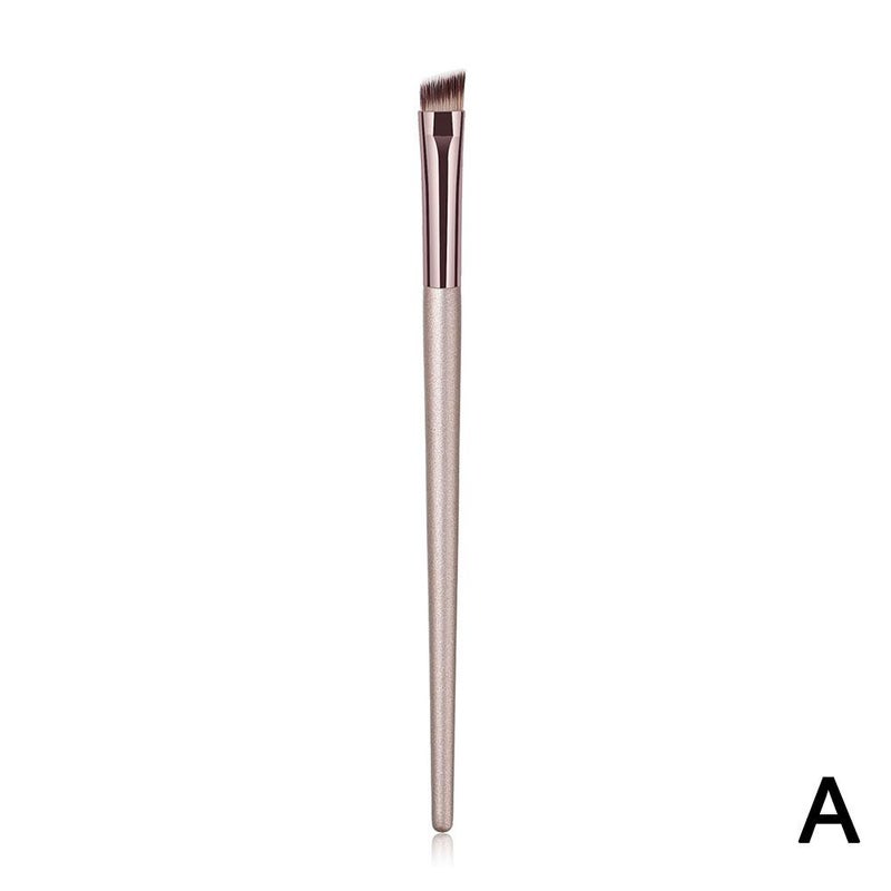 1 champagne-colored makeup brush = champagne-colored makeup brush